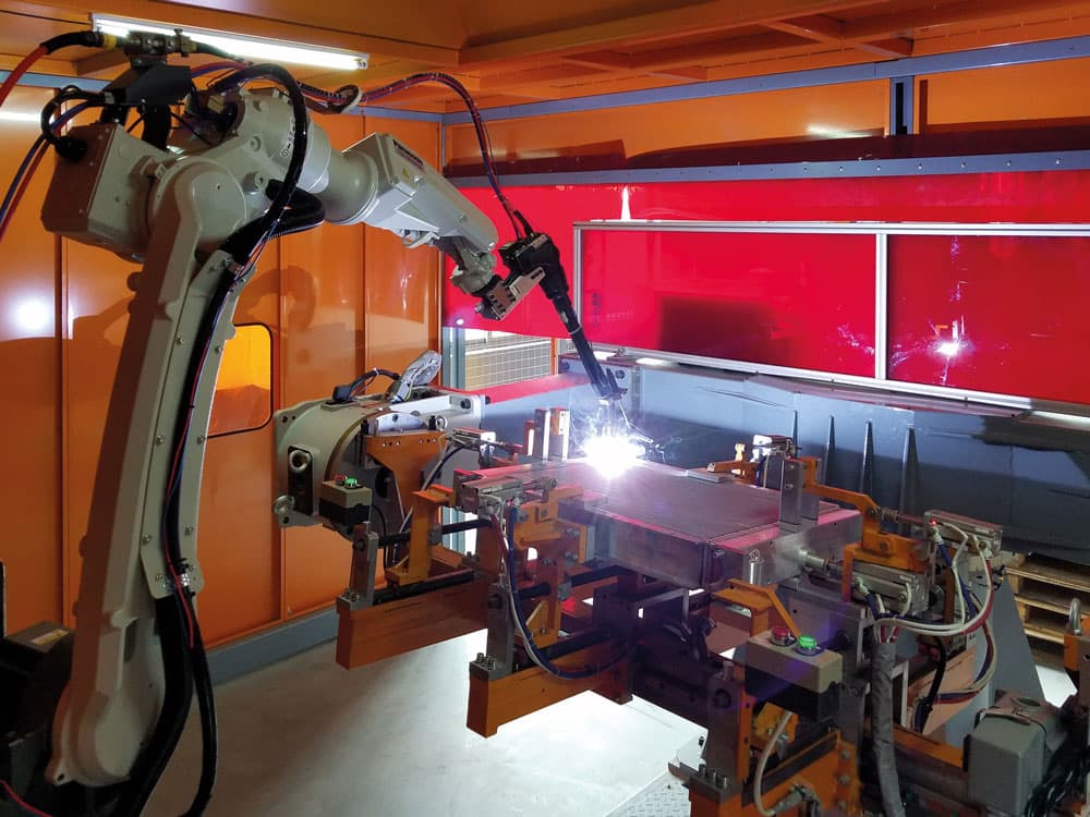 KTR cooler production plant - Robot welding system with rotating table
